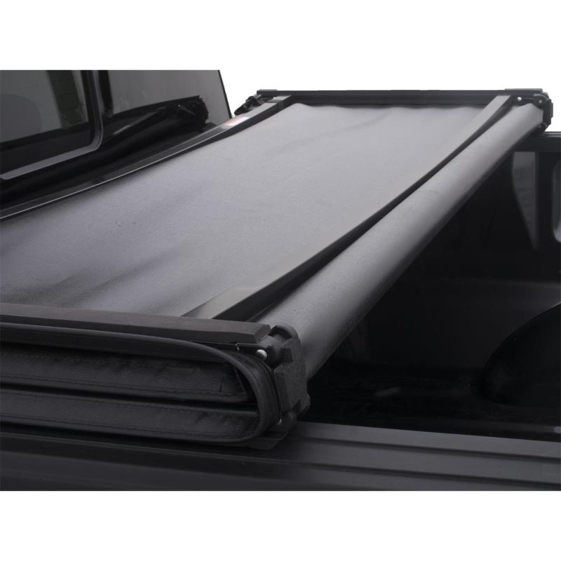 Lund 04-14 Ford F-150 (6.5ft. Bed) Genesis Tri-Fold Tonneau Cover - Black-Tonneau Covers - Soft Fold-Deviate Dezigns (DV8DZ9)