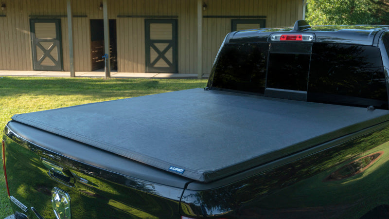 Lund 04-14 Ford F-150 (6.5ft. Bed) Genesis Tri-Fold Tonneau Cover - Black-Tonneau Covers - Soft Fold-Deviate Dezigns (DV8DZ9)